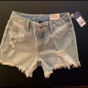 New high rise cut off shorts with fringe. Size 0